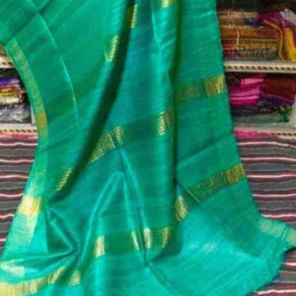 Tussar Ghicha Saree with Jari Border in Single Dye Green